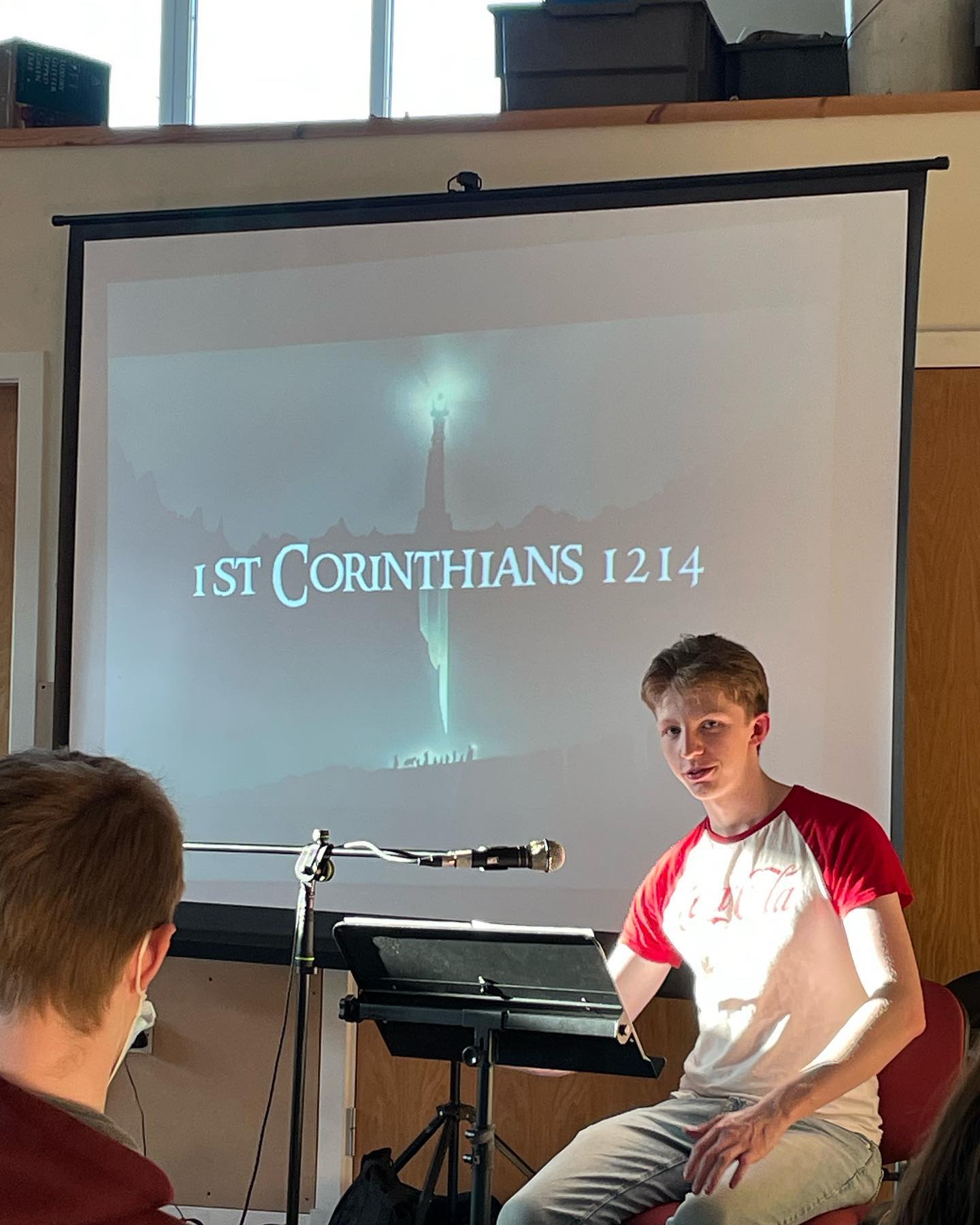 Daniel teaching youth group on the importance of fellowship.